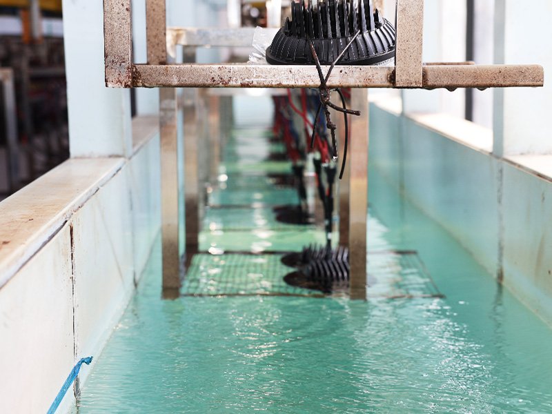 LED work lights undergoing water immersion testing to verify enclosure sealing