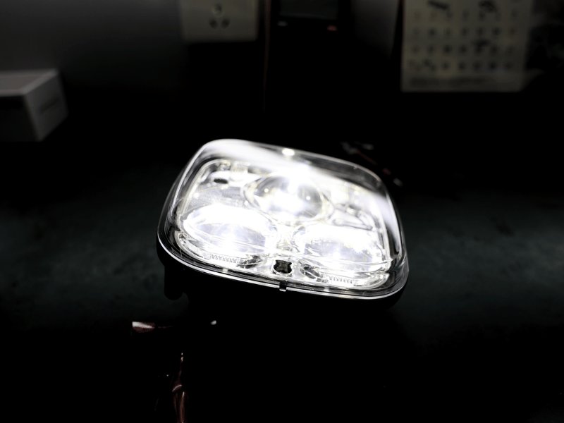 An LED work light powered on for inspection before packing